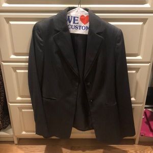 Two-piece woman’s suit with pants